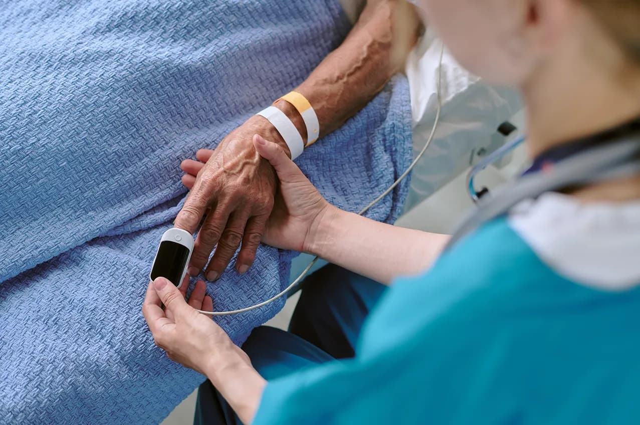 Doctor comforting a child patient
